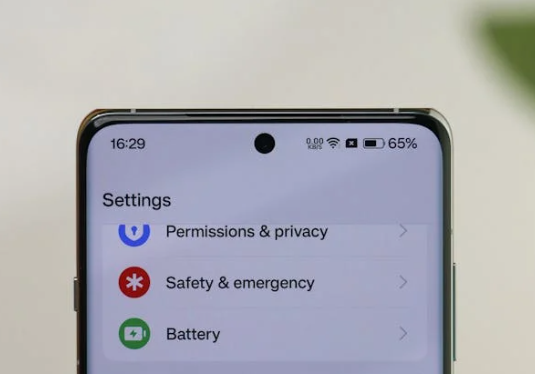 Smartphone screen displaying permissions and privacy settings for digital footprint cleanup.