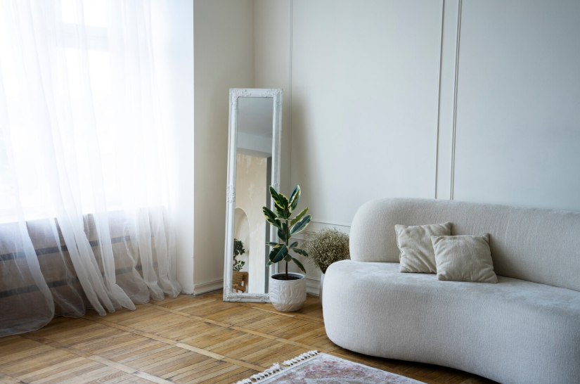 Decluttered living room with clean surfaces and minimal decor creating a calm, organized space.